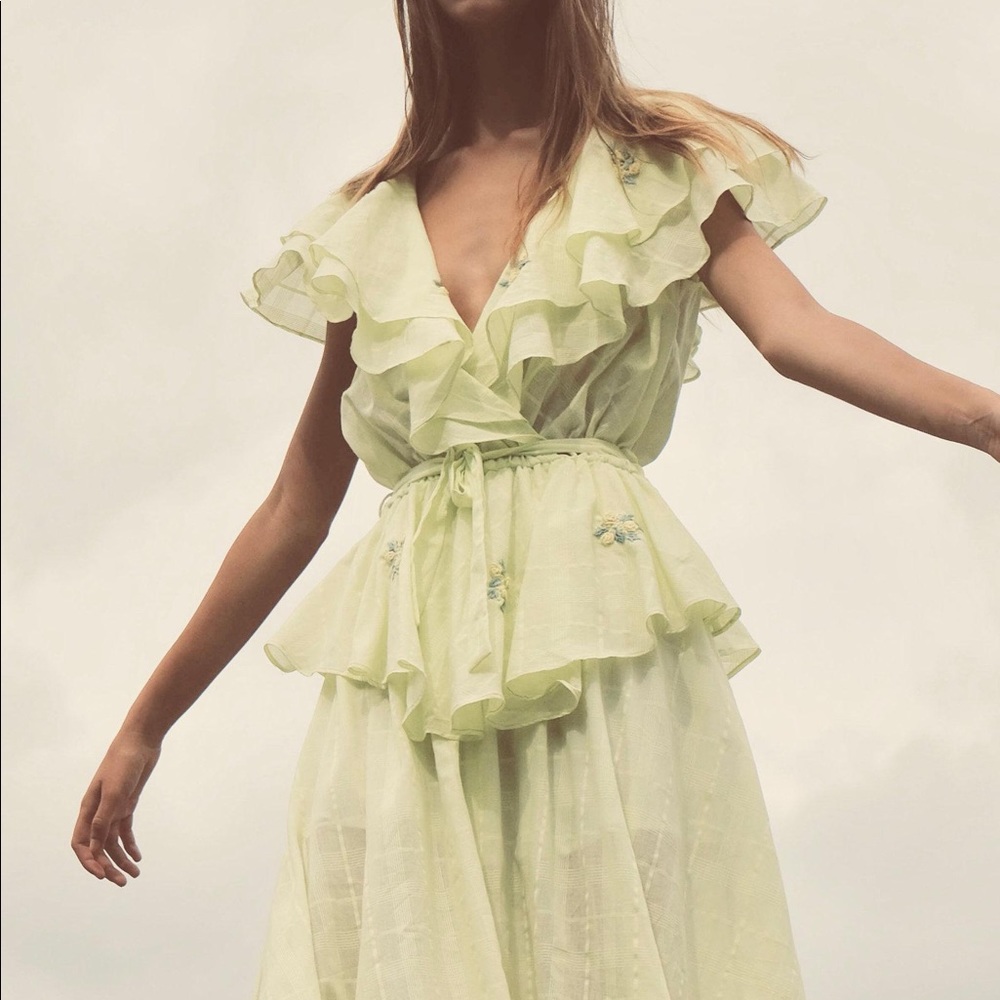 Innika Choo yellow wrap dress.